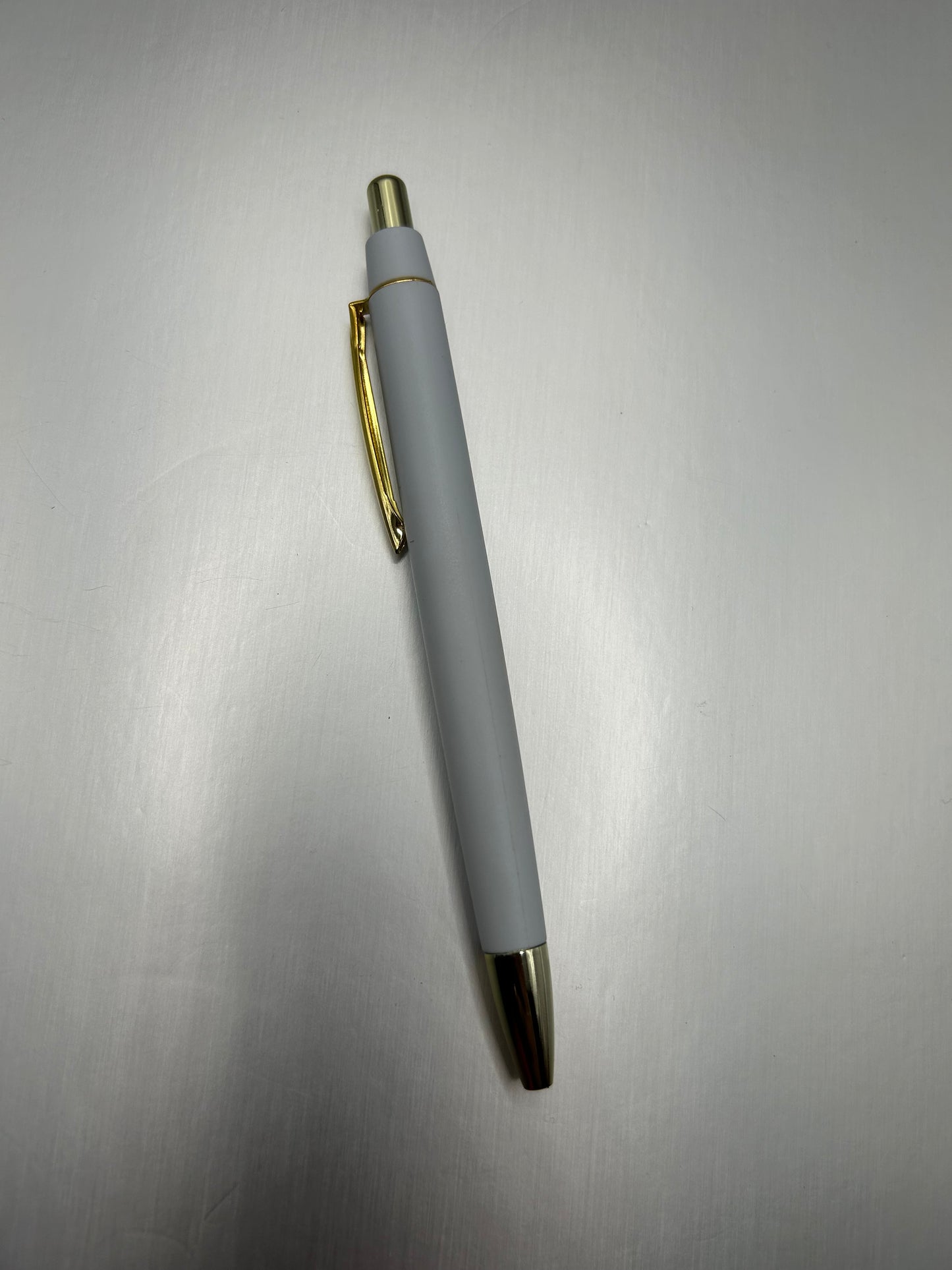 White and Gold Pen